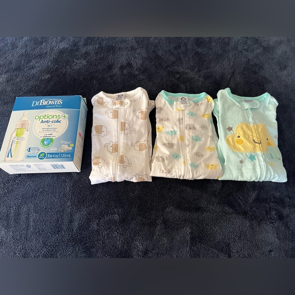 Unused Newborn Onesies and Glass Bottles